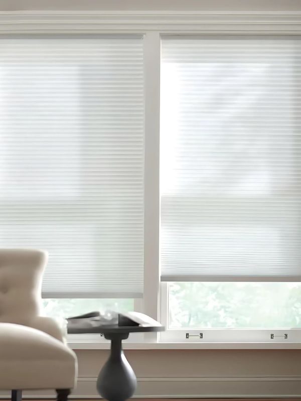 Honeycomb cells inside a cellular shade that trap air for insulation