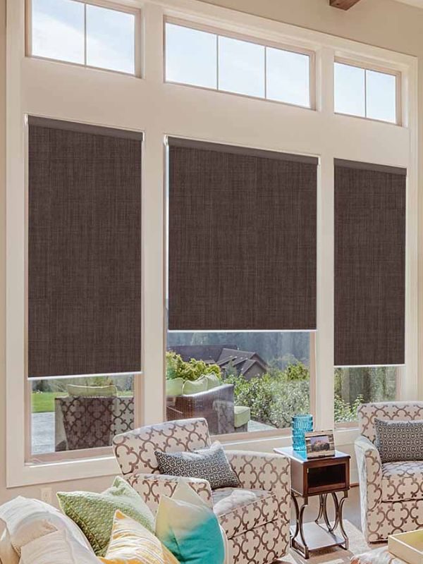 Brown roller shade fitted to a Vancouver window